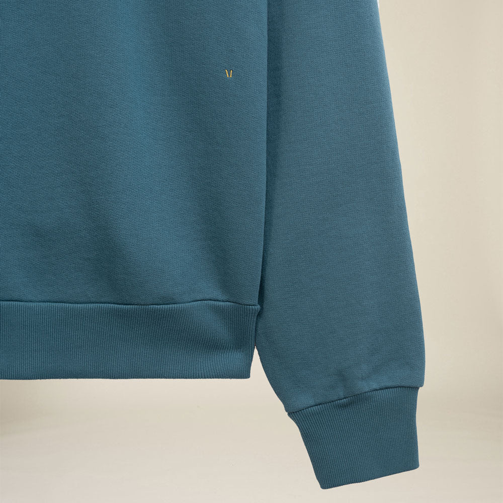 MANGOLA-Hoodie-Relaxed_blue-green_front-detail #color_petrol