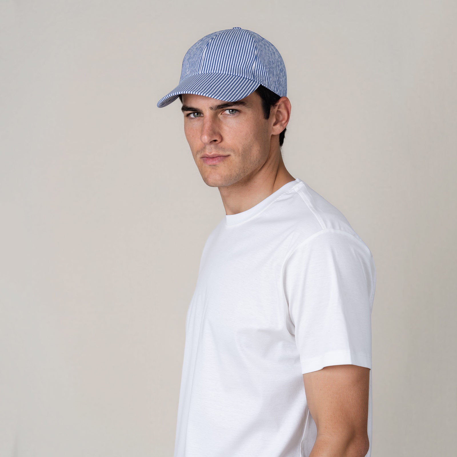 MANGOLA-Artisanal-Cap_Blue-White_man_front-side