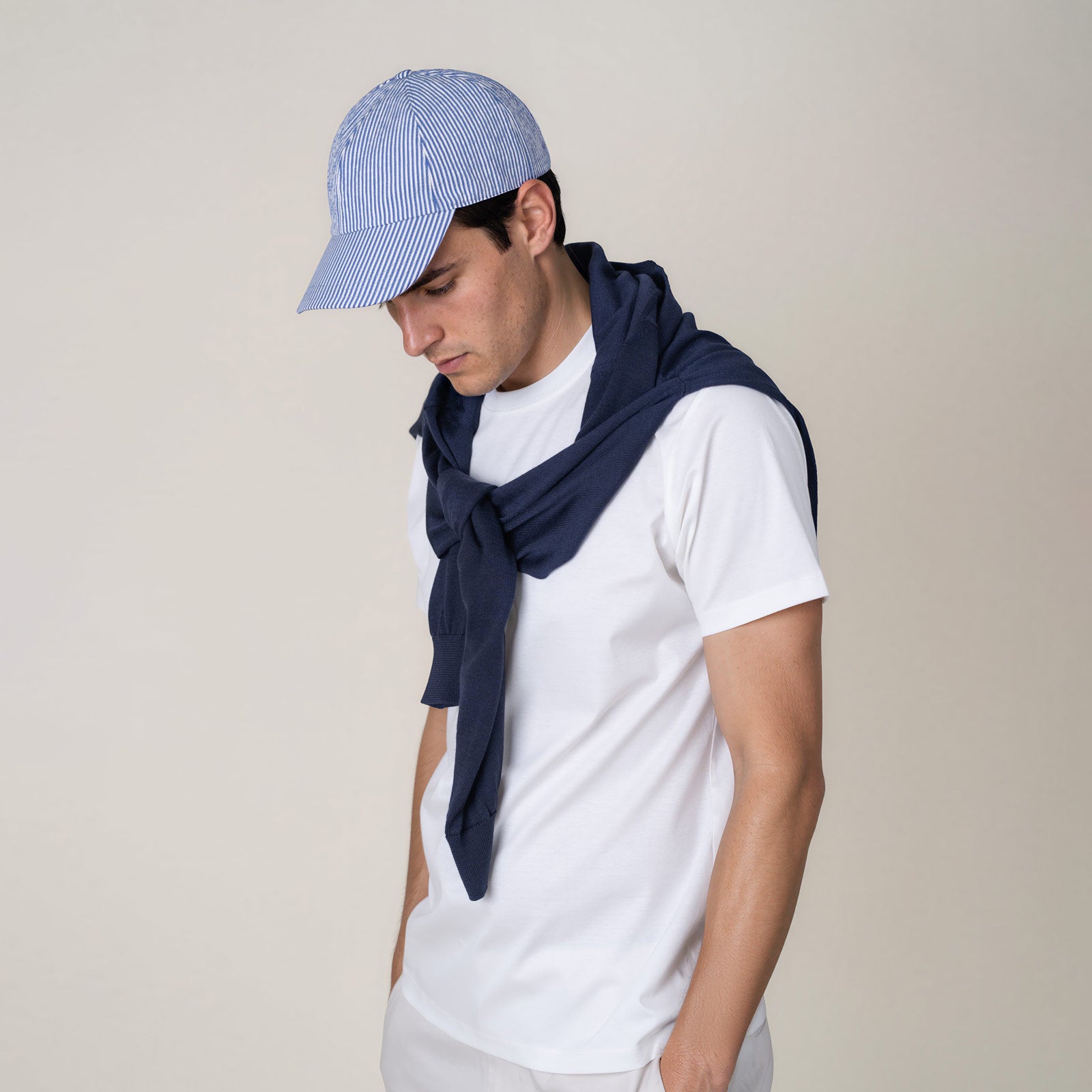 MANGOLA-Artisanal-Cap_Blue-White_man_side